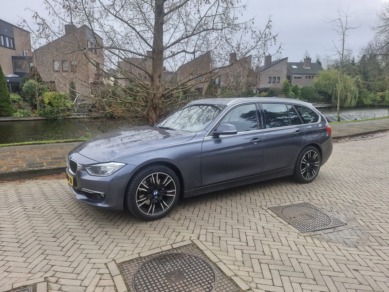 BMW 3-serie Touring - 328i High Executive - AutoWereld.nl