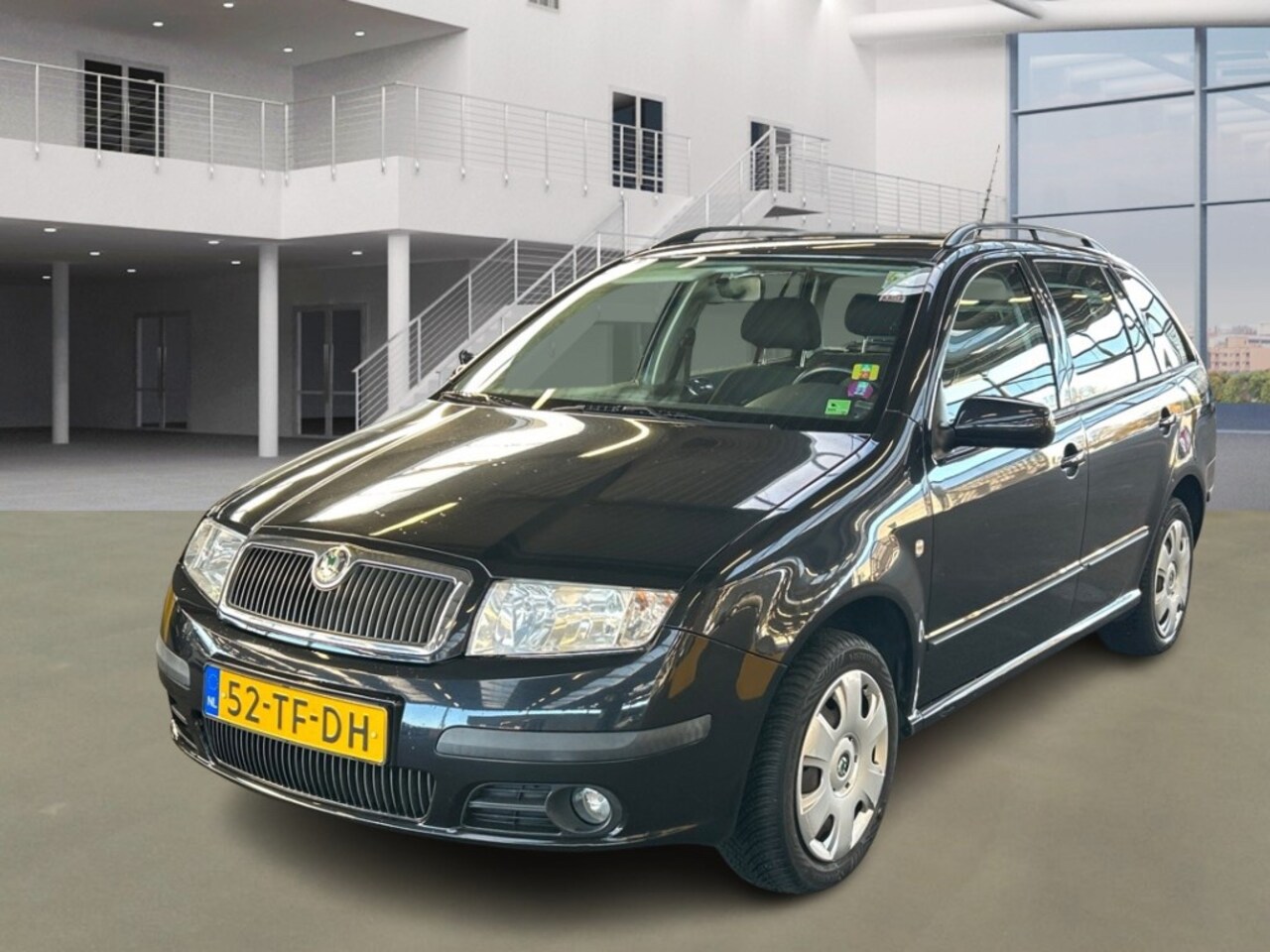 Skoda Fabia Combi - 1.4-16V Spirit+/LAAG KM - AutoWereld.nl