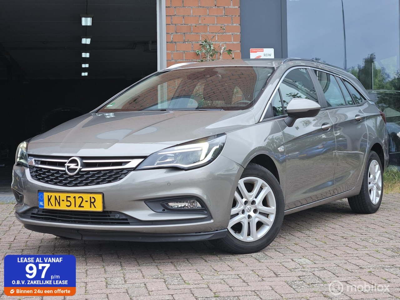 Opel Astra Sports Tourer - 1.0 Carplay Navi clima pdc nap - AutoWereld.nl