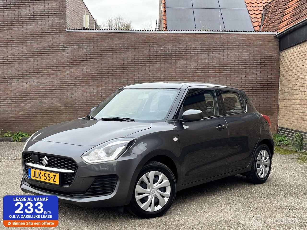 Suzuki Swift - 1.2 Comfort Smart Hybrid | Rijklaar - AutoWereld.nl