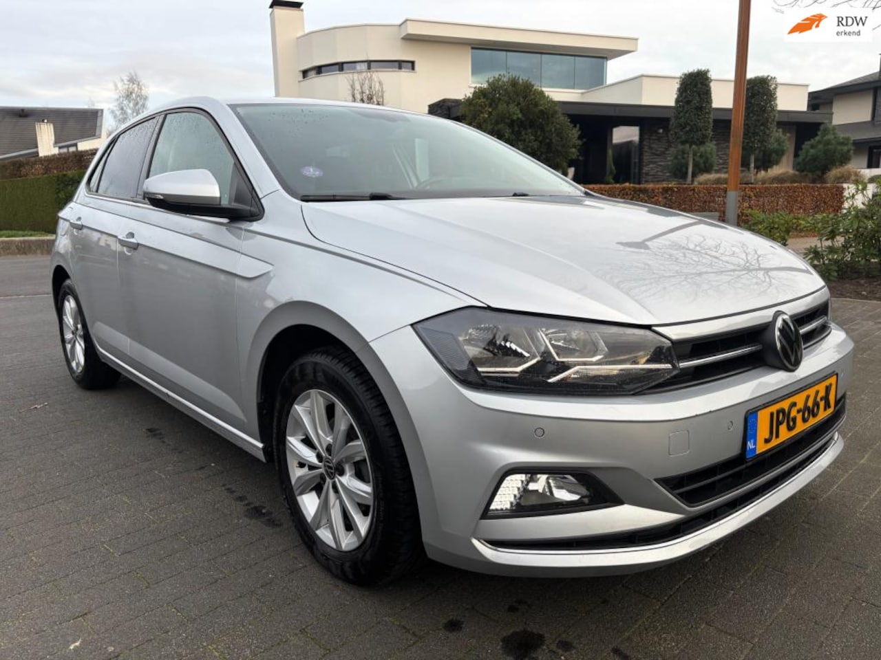 Volkswagen Polo - 1.0 TSI Highline b.t.w. auto navigatie trekhaak airco sport velgen. - AutoWereld.nl