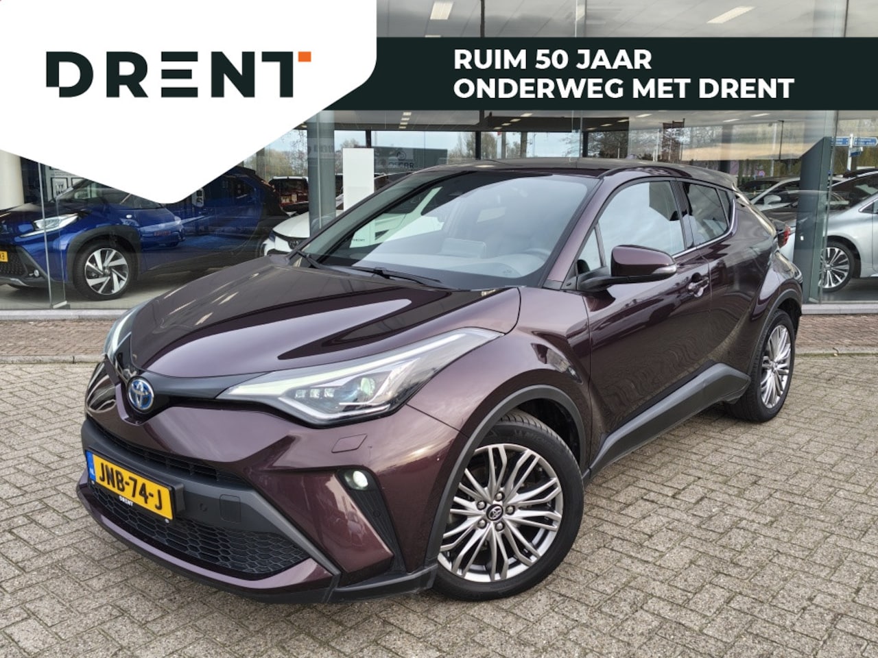 Toyota C-HR - 1.8 Hybrid Executive | Navi | Parkeersensoren | Leder/Stoffen be - AutoWereld.nl
