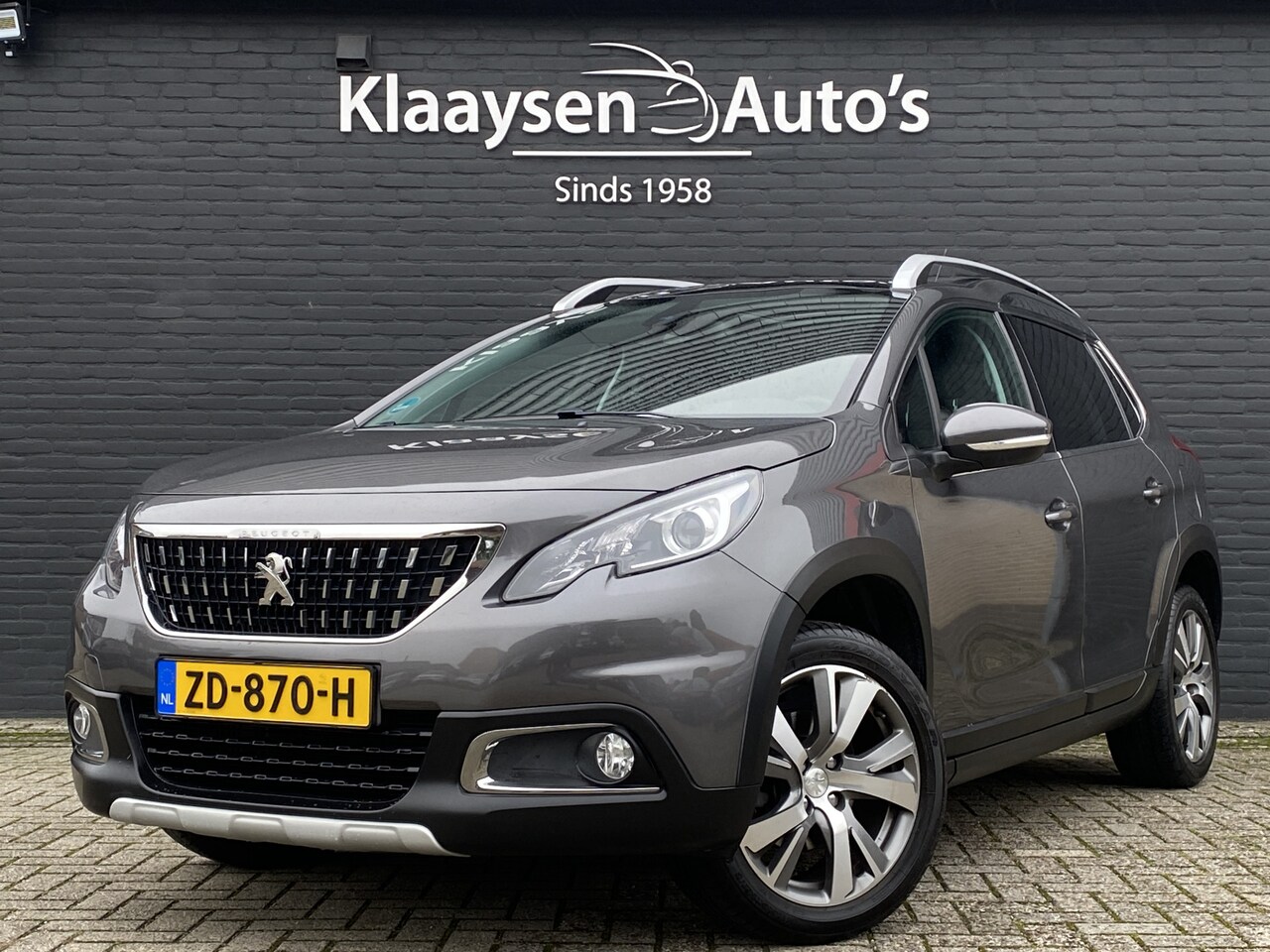 Peugeot 2008 - 1.2 PureTech Blue Lease Allure 130 pk | navigatie | panoramadak | camera | apple carplay | - AutoWereld.nl