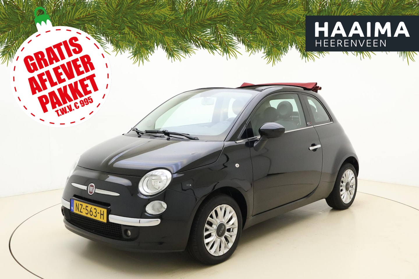 Fiat 500 C - 1.2 Lounge Cabrio | rood stoffen dak | 70pk | Airco | Cruise | Lm Velgen - AutoWereld.nl