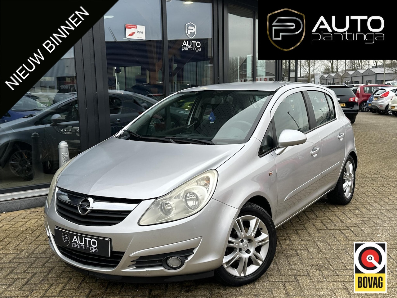 Opel Corsa - 1.2-16V Cosmo 80PK | NL AUTO | Airco | Cruise Control | 5 Deurs | Lichtmetalen Velgen | - AutoWereld.nl