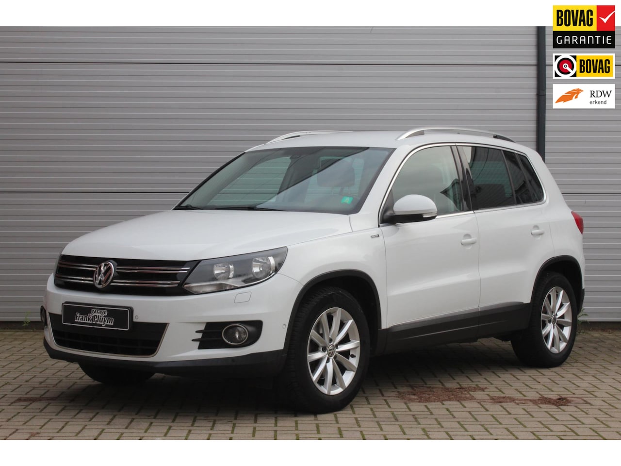 Volkswagen Tiguan - 1.4 TSI Sport&Style DSG/Trekhaak/4-Seizoensbanden - AutoWereld.nl