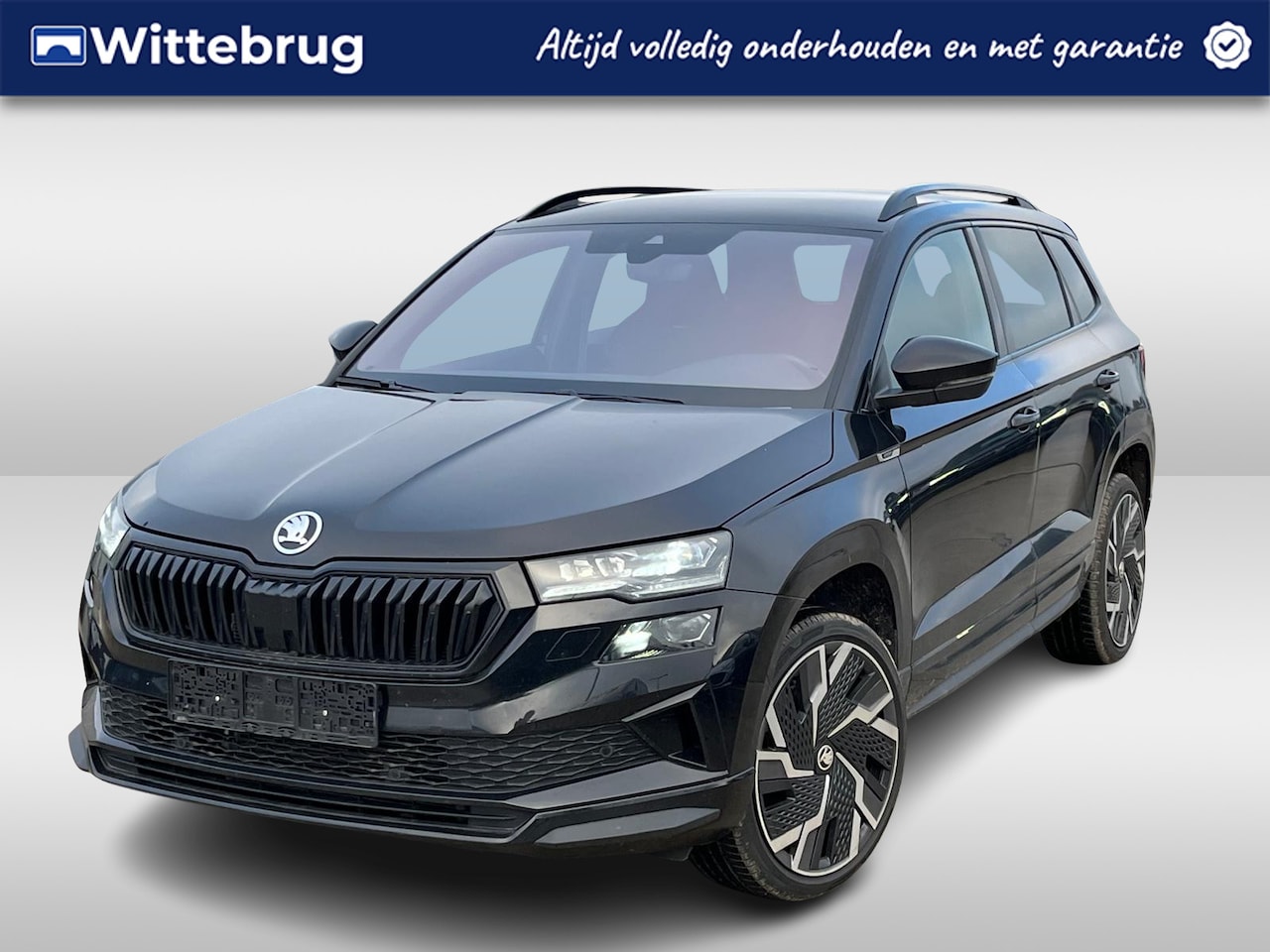 Skoda Karoq - 1.5 TSI ACT Sportline Business / 19"LMV / CAMERA / Elektr. Klep / NAVI / APP.Connect / Ele - AutoWereld.nl