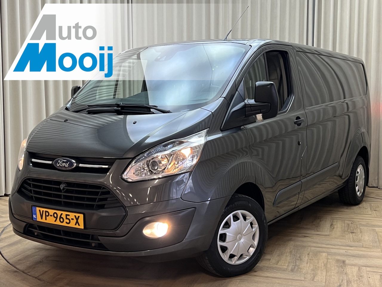 Ford Transit Custom - 290 2.2 TDCI L2H1 *Camera* PDC V+A / Trekhaak / Cruise / Lane Assist / Navigatie / Bluetoo - AutoWereld.nl