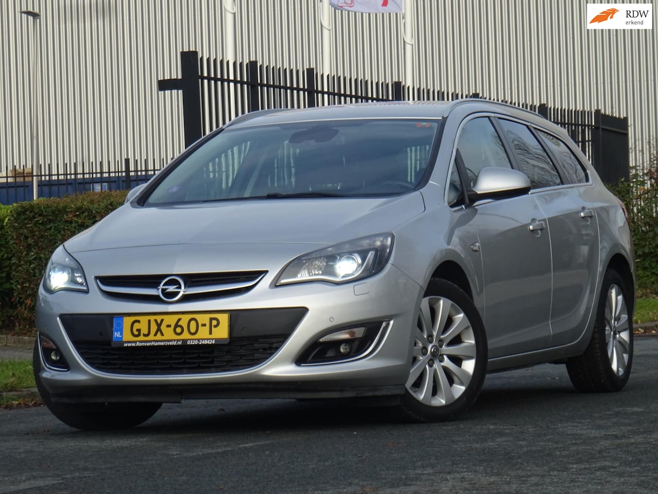 Opel Astra Sports Tourer - 1.4 Turbo Sport + XENON/NAVI/LEER - AutoWereld.nl