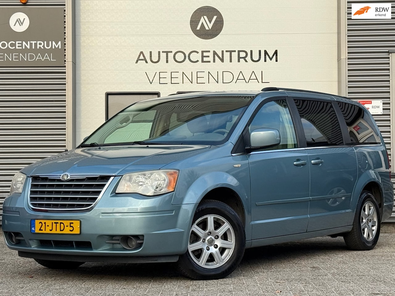 Chrysler Grand Voyager - 3.8 V6 AUT 193 PK 7-ZITS LEDER/SCHUIFDEUR/TREKHAAK/AIRCO - AutoWereld.nl