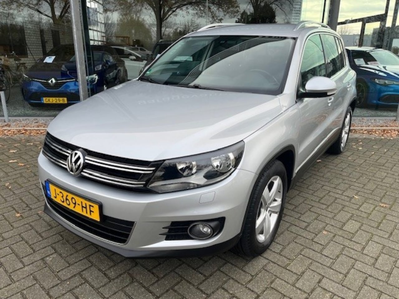 Volkswagen Tiguan - 1.4 TSI SPORTenSTYLE NAVI TREKHAAK - AutoWereld.nl