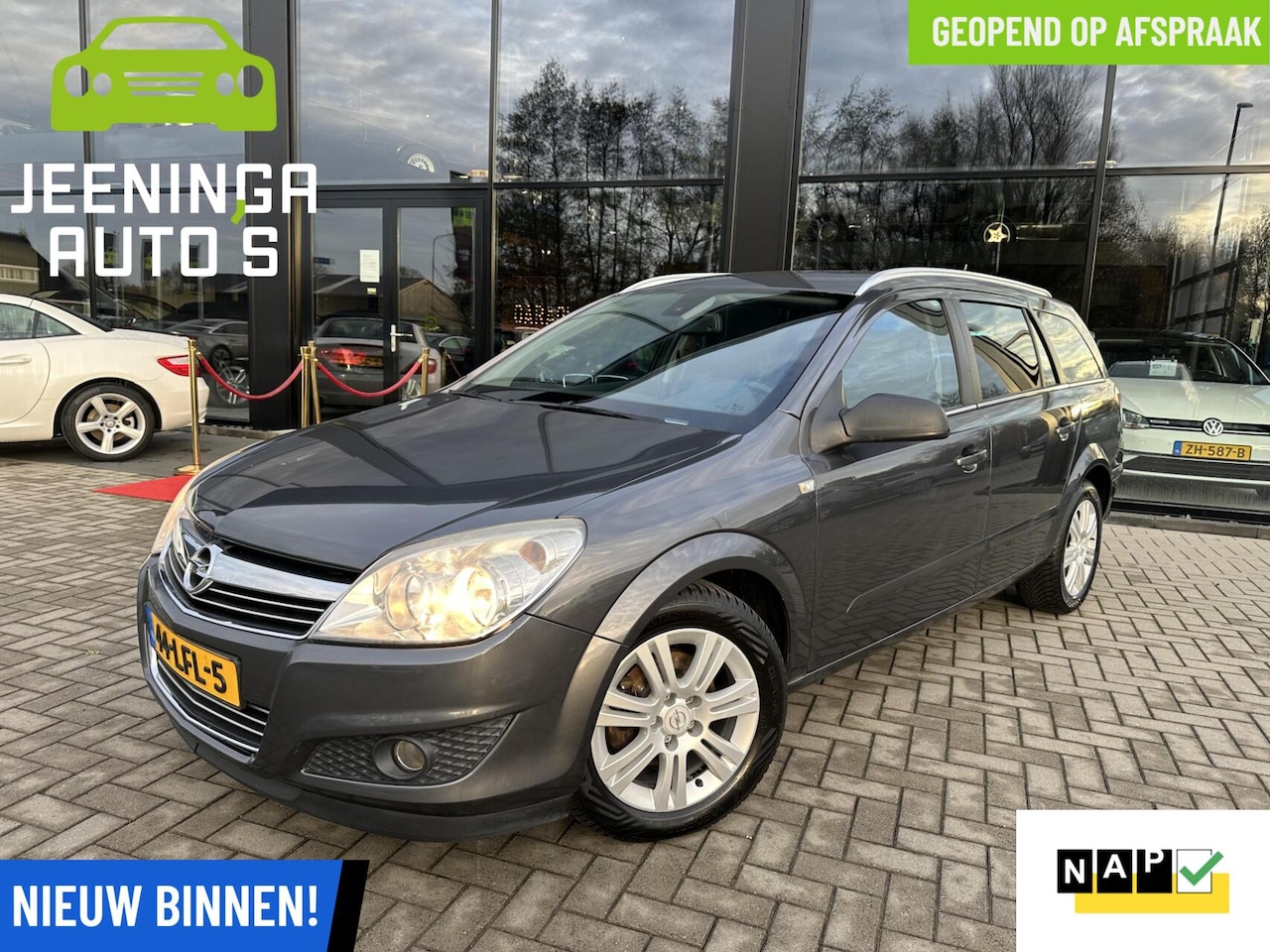 Opel Astra Wagon - 1.6 Cosmo|Trekhaak|Leer|Stoelverwarming|Navi|NAP - AutoWereld.nl