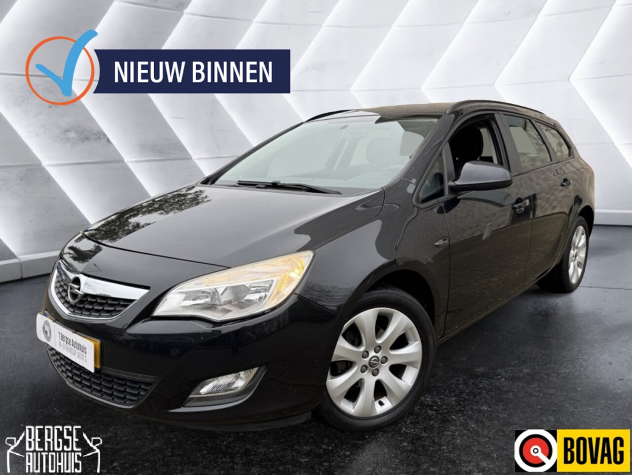 Opel Astra Sports Tourer - 1.4 Turbo Bns + Airco Cruise Navi - AutoWereld.nl