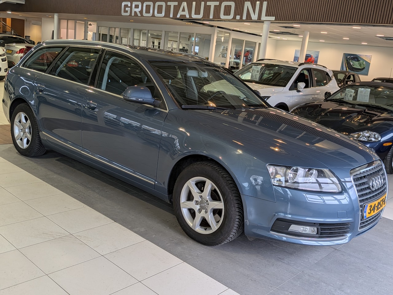 Audi A6 Avant - 2.0 TFSI Business Edition Automaat Airco, Trekhaak, Cruise control, Navi - AutoWereld.nl
