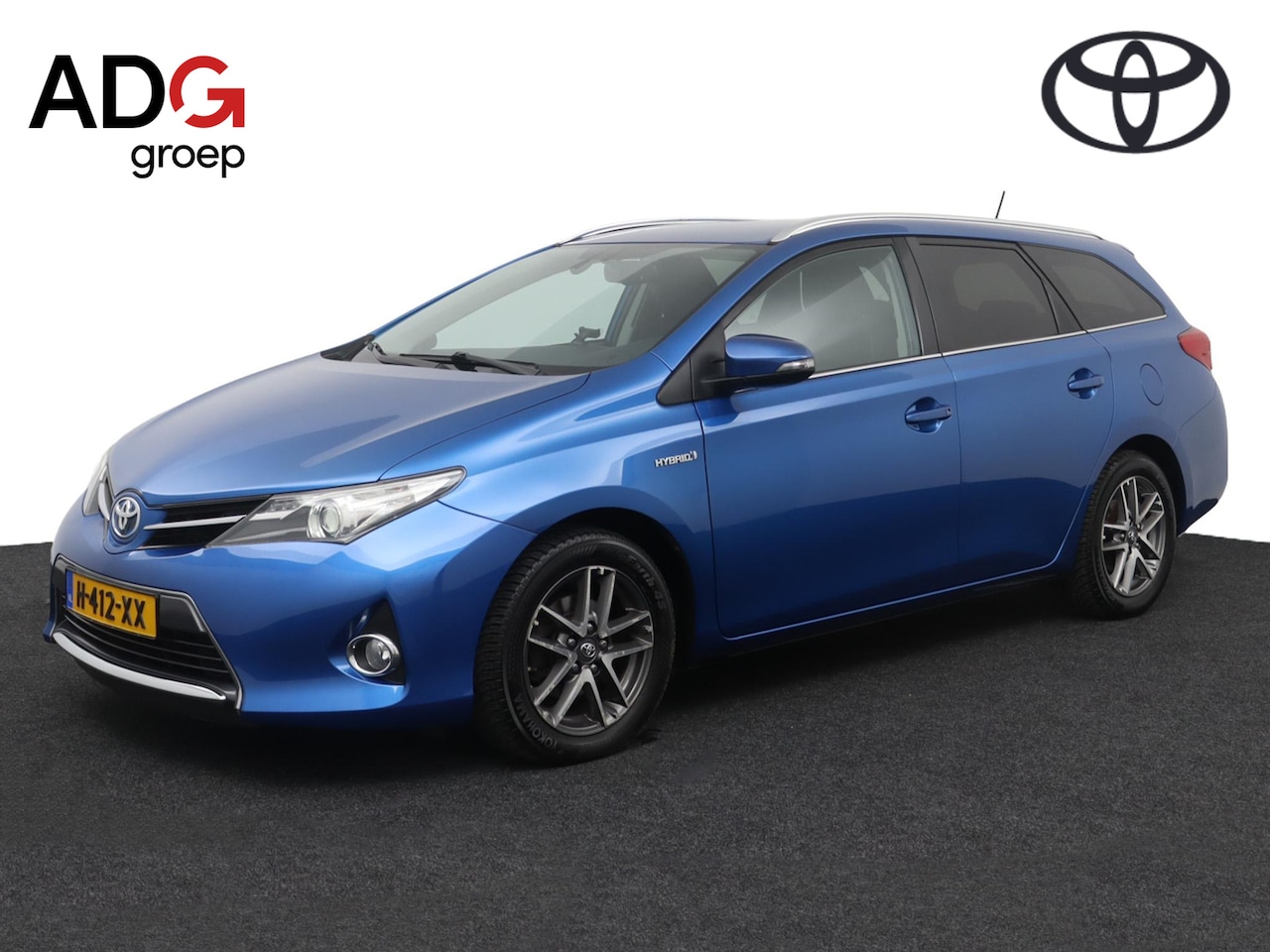 Toyota Auris Touring Sports - 1.8 Hybrid | Climate control | Cruise control | Parkeercamera |  Keyless | - AutoWereld.nl