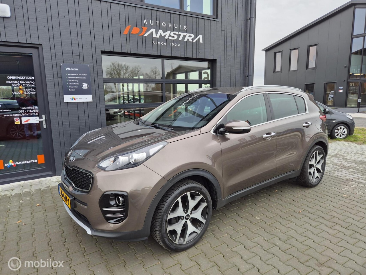Kia Sportage - 1.6 GDI First Edition|Leder|Trekhaak|Camera|Navi|Cruise| - AutoWereld.nl