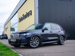 BMW X5 - xDrive50e | Trekhaak | M Sport | Achteras besturing | Schuif-/kantel Pano | Softclose | Ad
