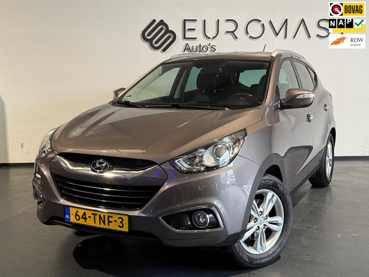 Hyundai ix35 - 2.0i Style Automaat Navi Halfleder Cruise Camera Nieuwe Apk - AutoWereld.nl