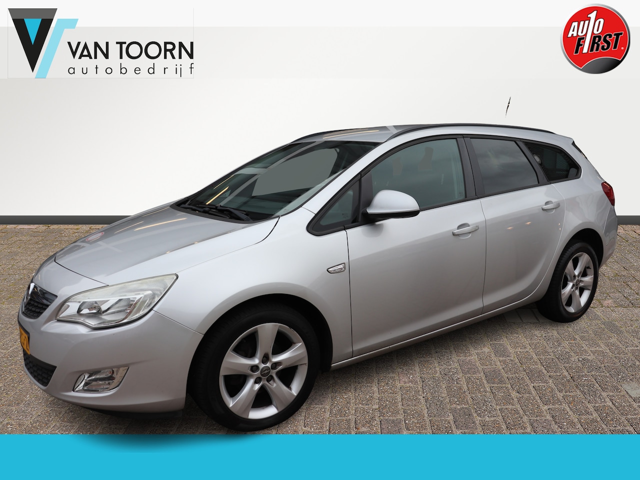 Opel Astra Sports Tourer - 1.4 Turbo Edition Goed rijdende, dealeronderhouden auto! Trekhaak. - AutoWereld.nl