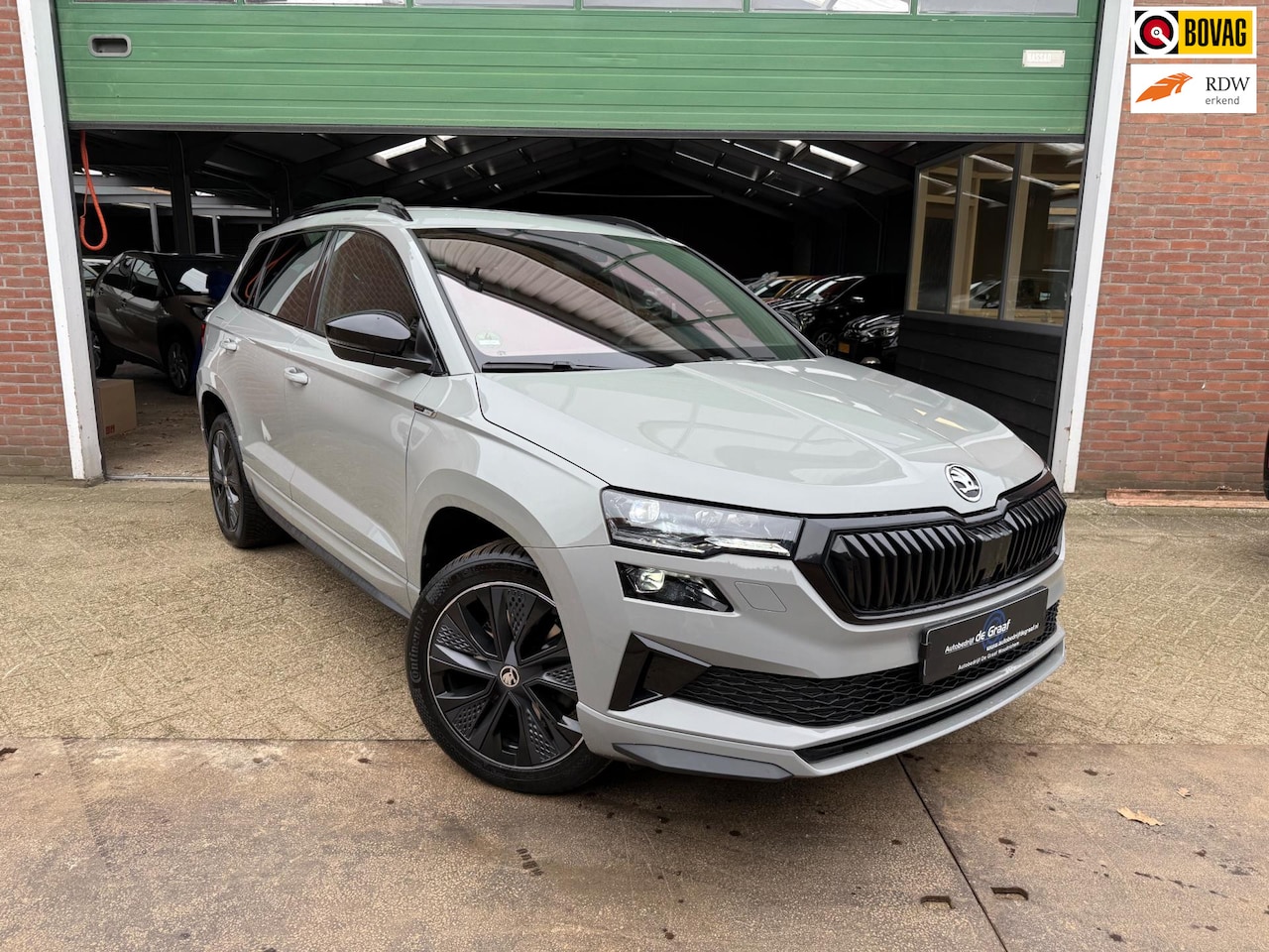 Skoda Karoq - 1.5 TSI ACT Sportline DSG|NAVI/CAMERA/TRHK/SFEERVRL - AutoWereld.nl