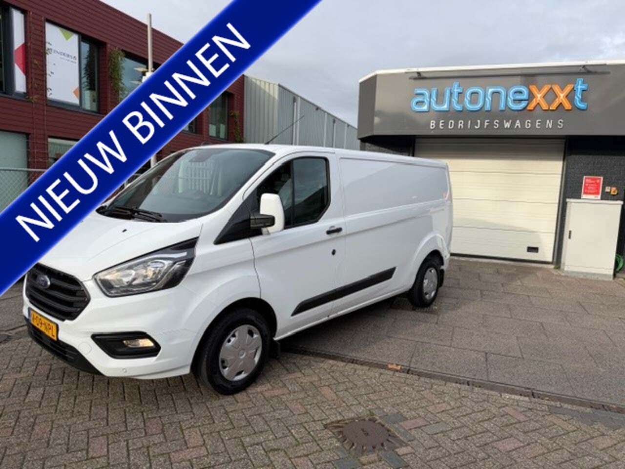 Ford Transit Custom - 300 2.0 TDCI L2H1 Trend AIRCO I PDC I 3-ZITS I 1e EIGENAAR I COMPLETE ONDERHOUDSHISTORIE - AutoWereld.nl
