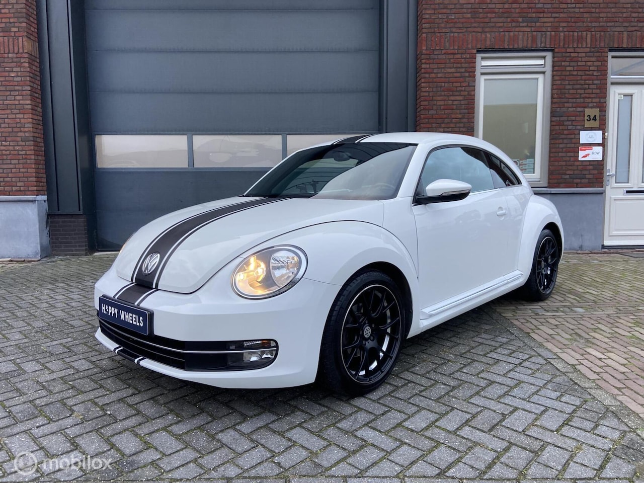 Volkswagen Beetle - (Kever) - 1.2 TSI - Design - 2014 - AutoWereld.nl