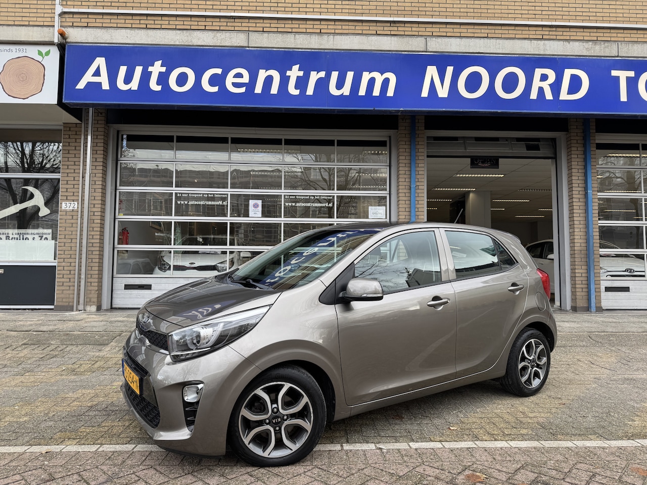 Kia Picanto - 1.0 CVVT DynamicPlusLine 68495KM! NAP | Navigatie | Apple Carplay | Climate Control | Crui - AutoWereld.nl