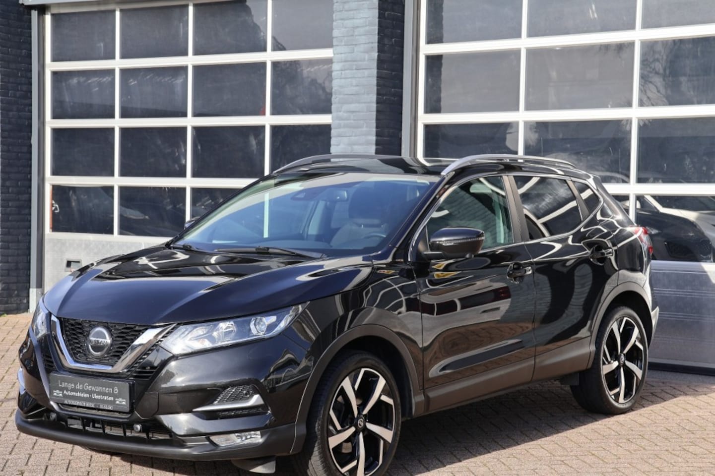Nissan Qashqai - 1.2 Tekna 1.2 Tekna, panoramadak, navi, trekhaak - AutoWereld.nl
