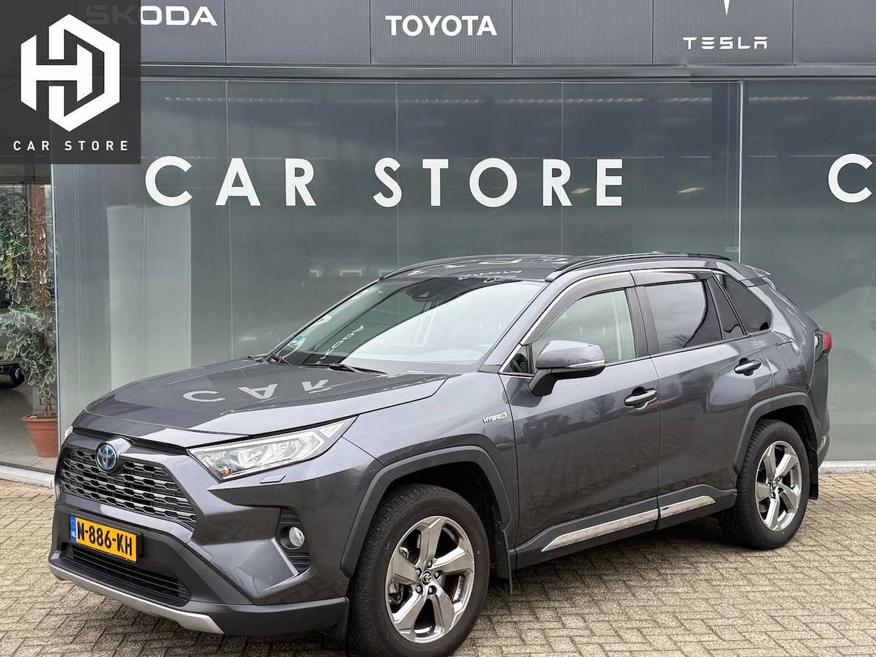 Toyota RAV4 - 2.5 Hybrid AWD Alcantara|Navi|Camera|Carplay|Dealer Onderhouden - AutoWereld.nl