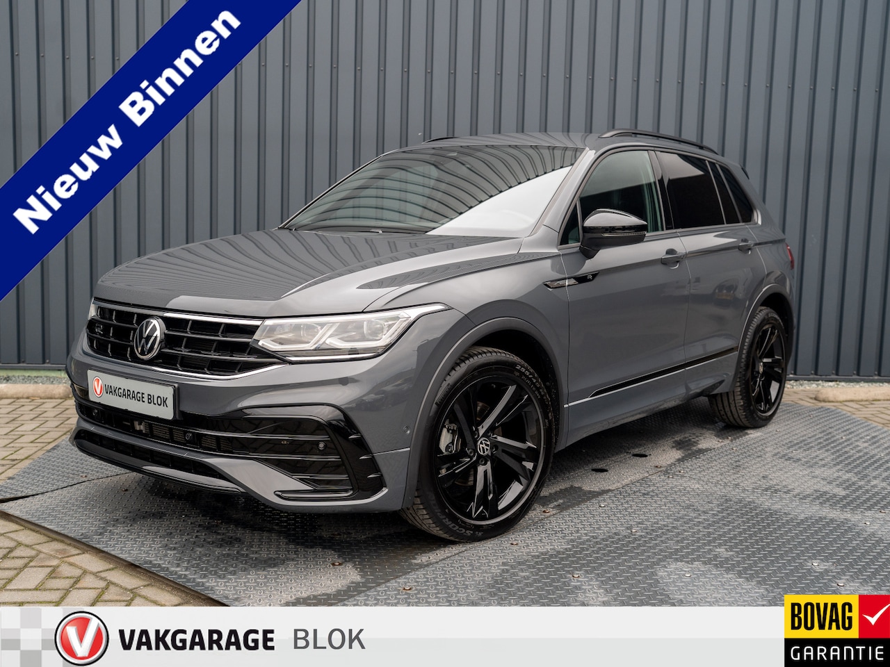 Volkswagen Tiguan - 1.5 TSI R-Line Business+ | Head Up | IQ Light | Side Assist | Keyless | Camera | Elk. A-kl - AutoWereld.nl