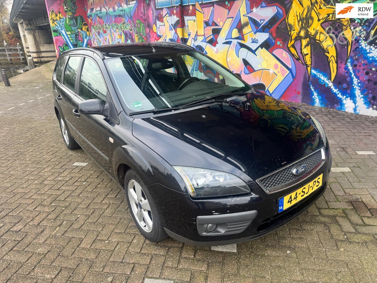 Ford Focus Wagon - 1.6-16V Futura airco sport velgen stereo elektrische ramen cv trekhaak boekjes aanwezig bo - AutoWereld.nl