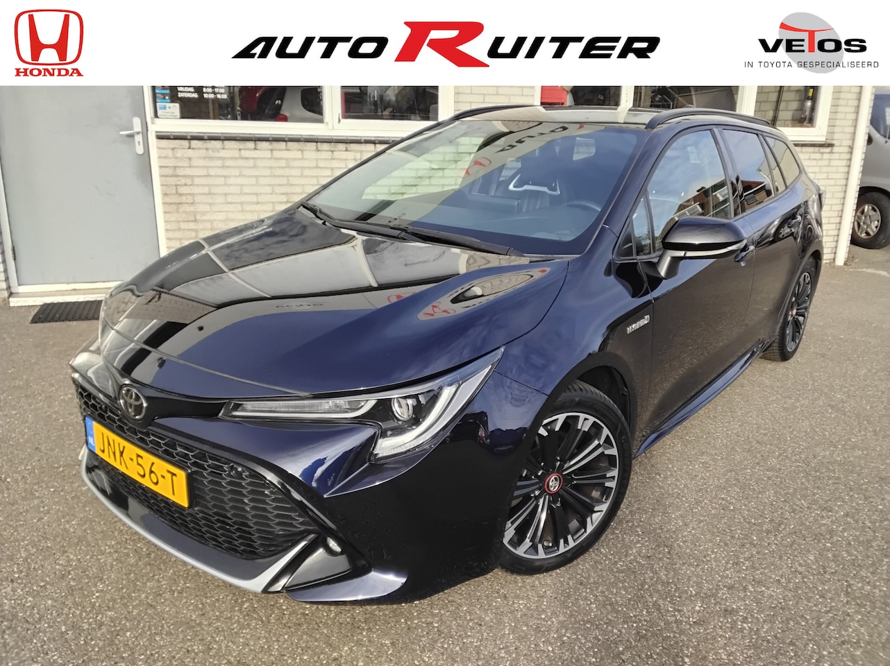 Toyota Corolla Touring Sports - 2.0 Hybrid Dynamic Two tone - AutoWereld.nl