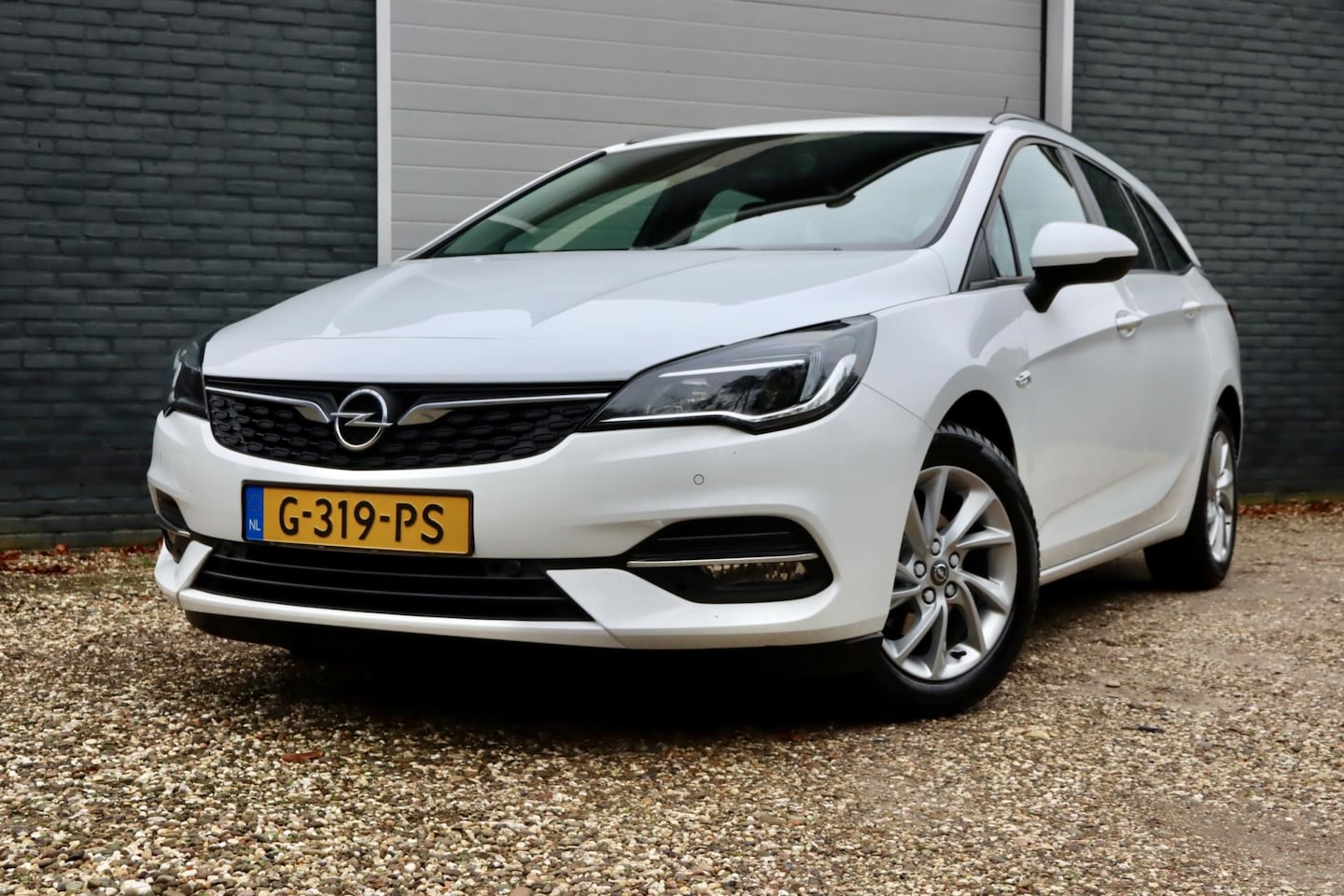 Opel Astra Sports Tourer - 1.2 Edition | NAVIGATIE | CRUISE CONTROL | TREKHAAK | CARPLAY - AutoWereld.nl