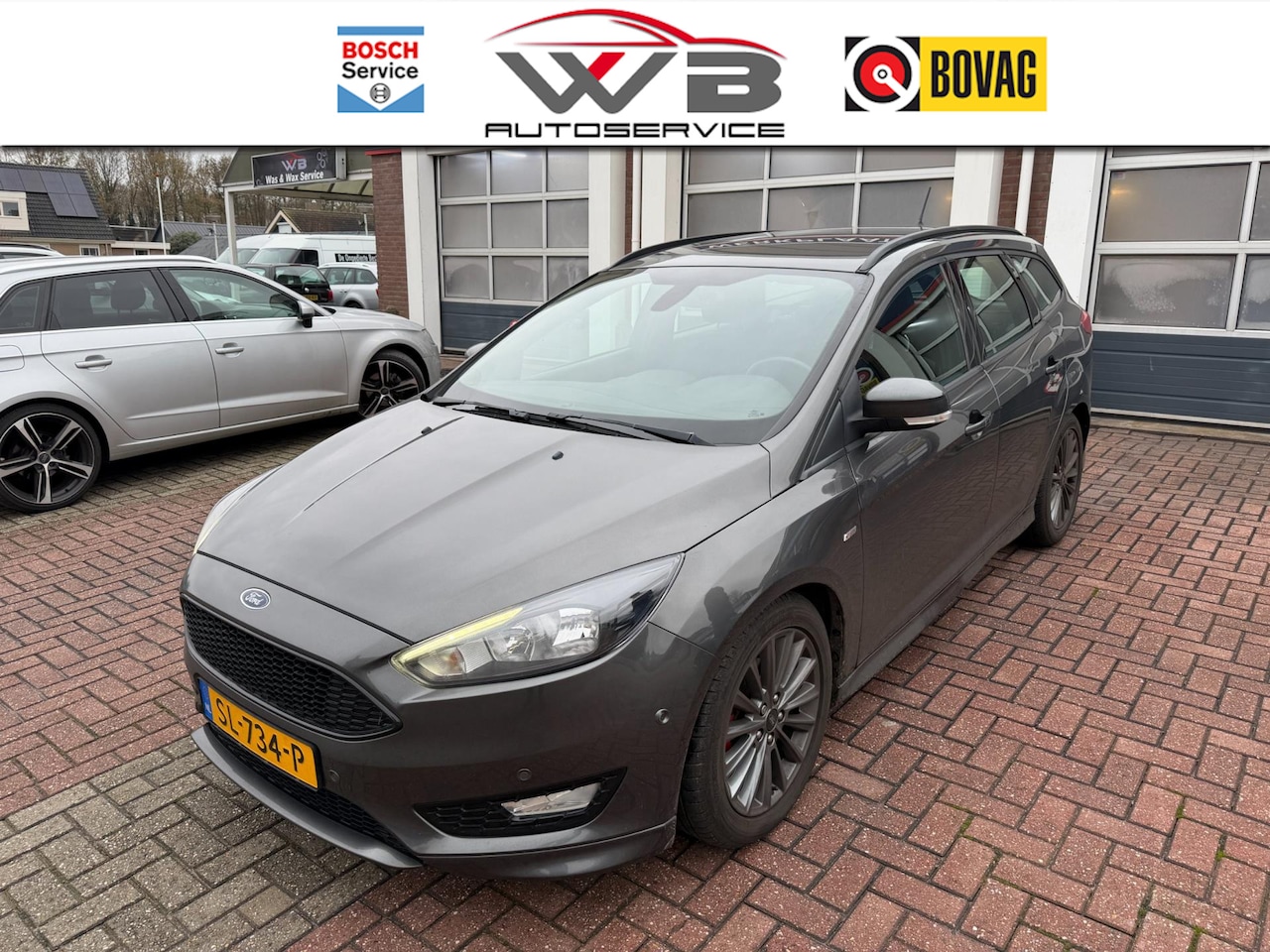 Ford Focus Wagon - 1.0 ST-Line Navi I Cruise I Carplay I PDC - AutoWereld.nl