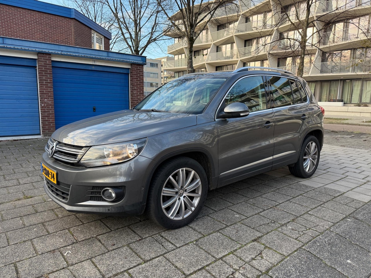 Volkswagen Tiguan - 1.4 TSI Sport&Style - AutoWereld.nl