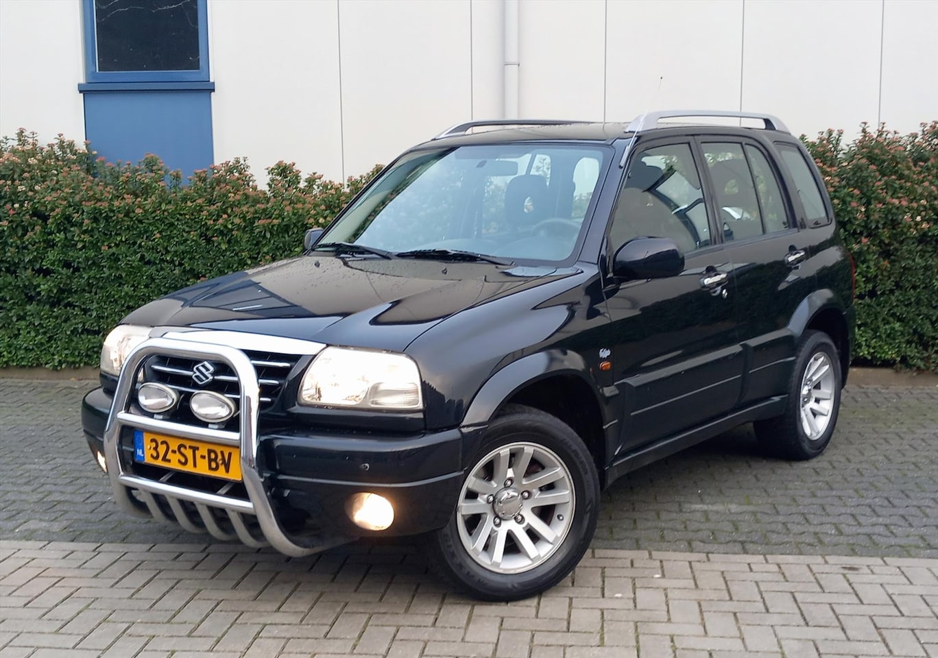Suzuki Grand Vitara - 2.0 5D Freestyle 4X4 Airco/Leer/Trekhaak - AutoWereld.nl