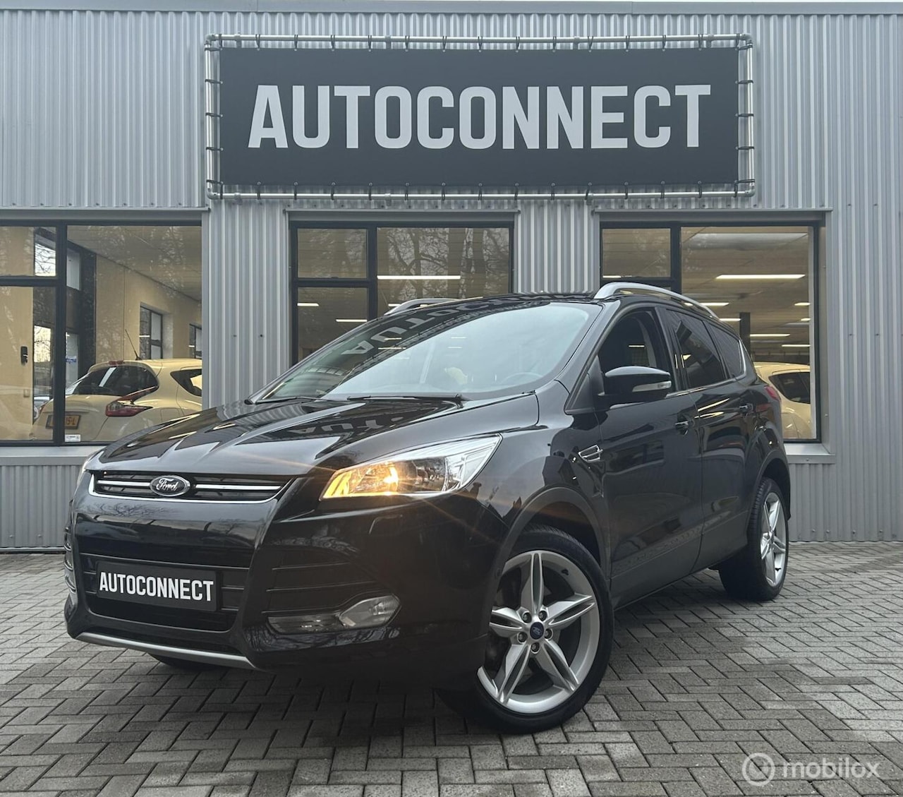 Ford Kuga - 1.5 Titanium 4WD NAVI, LEDER, CRUISE, 1e EIGENAAR - AutoWereld.nl