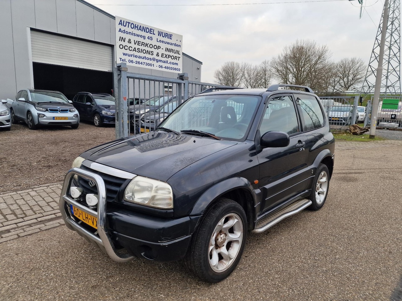Suzuki Grand Vitara - 1.6 Metal Top Wide Body / 4x4 - AutoWereld.nl