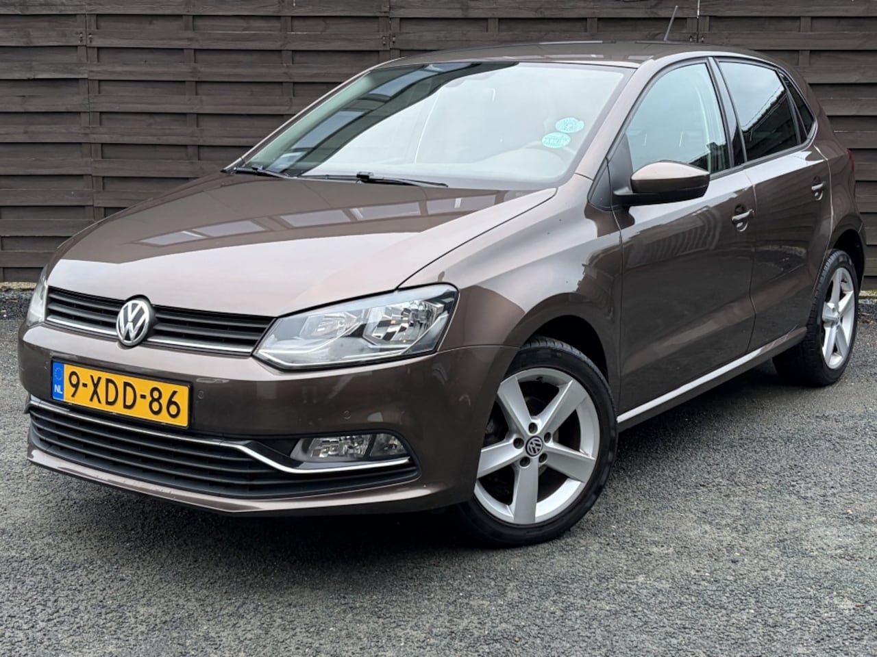 Volkswagen Polo - 1.2 TSI Highline / BT / CRUISE / PDC / NAVI / NAP - AutoWereld.nl