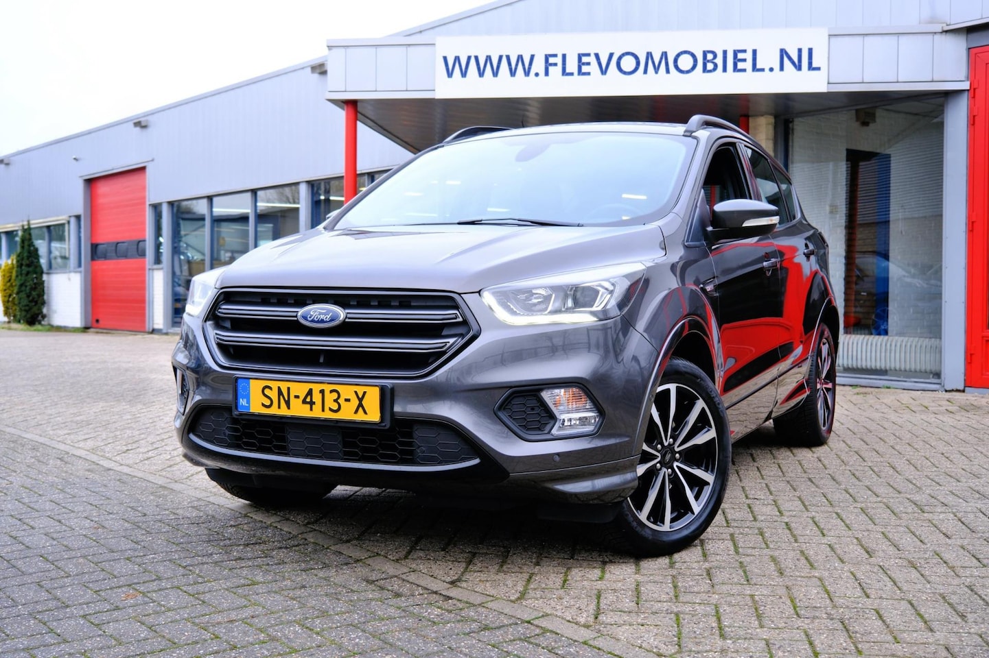 Ford Kuga - 1.5 150pk EcoBoost ST Line Navi|Leder-alcantara|PDC|ParkAssist|LMV - AutoWereld.nl
