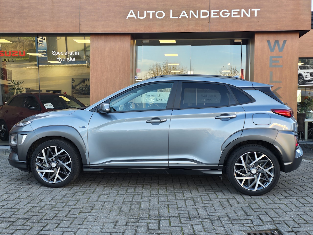 Hyundai Kona - 1.6 GDI HEV Premium | Lederen Bekleding | Stoel/Stuur verwarming | Trekhaak - AutoWereld.nl