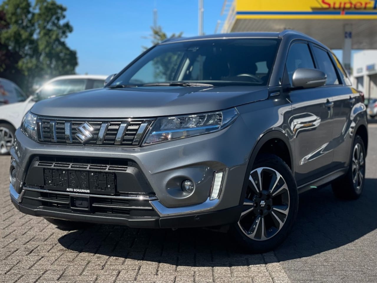 Suzuki Vitara - 1.4 STYLE HALF-LEER NAVI CAMERA ADD.CRUISE - AutoWereld.nl