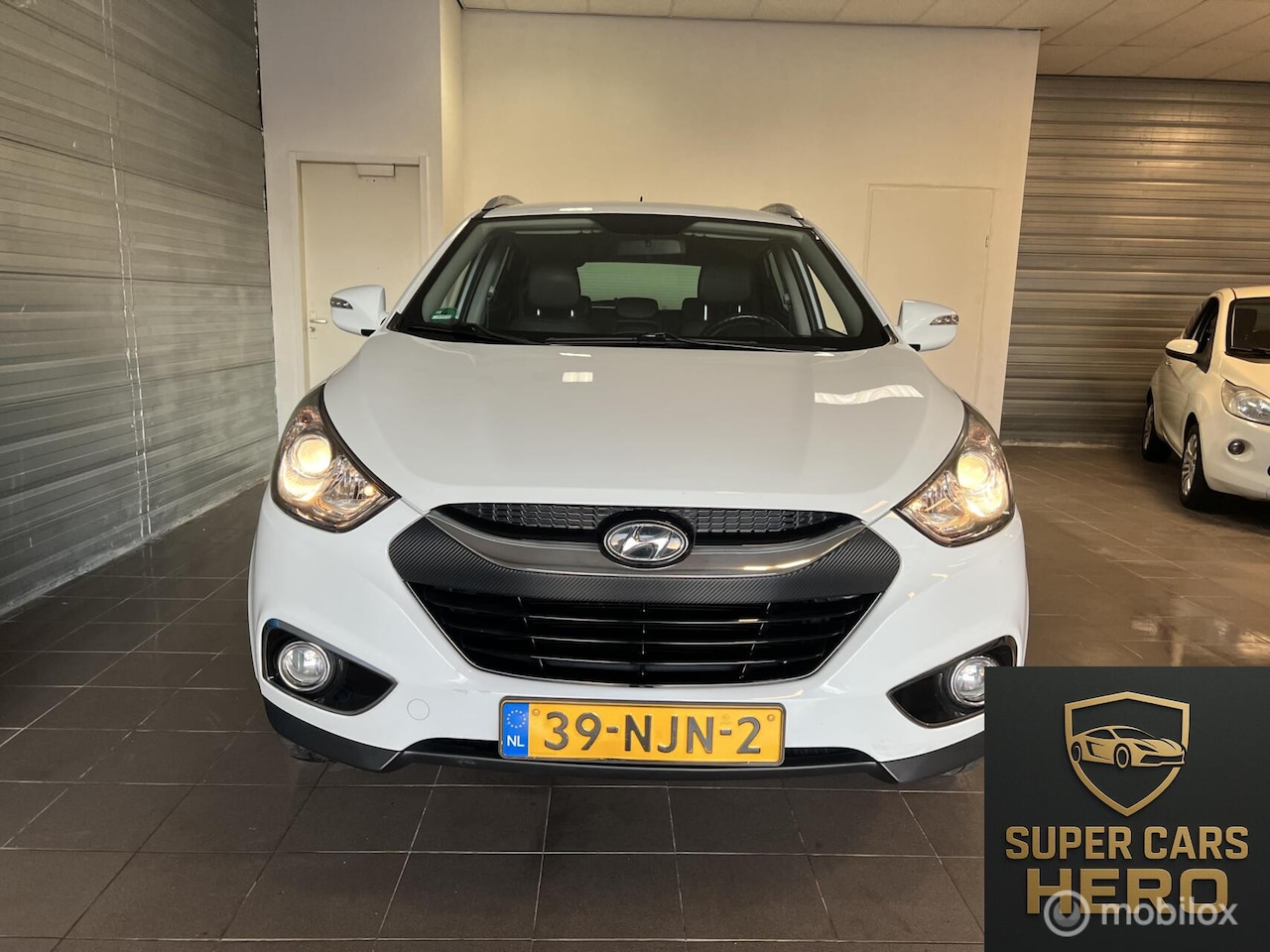 Hyundai ix35 - 2.0i Business Edition 2.0i Business Edition - AutoWereld.nl