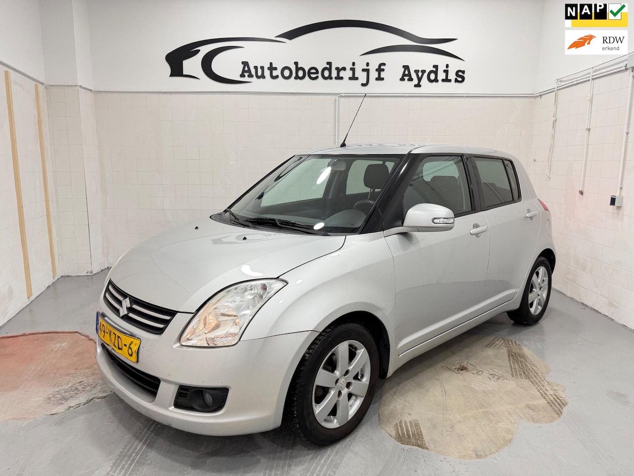 Suzuki Swift - 1.3 Limited Airco EL Ramen Stoelver 5Deurs - AutoWereld.nl