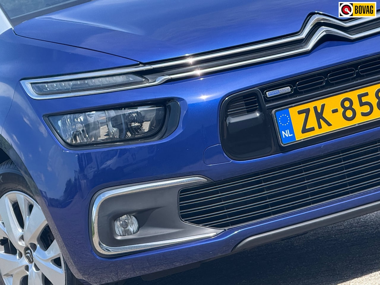 Citroën Grand C4 Picasso - 1.2 PureTech Shine 7pers Automaat - Lazuli Bleu - 70dkm - AutoWereld.nl