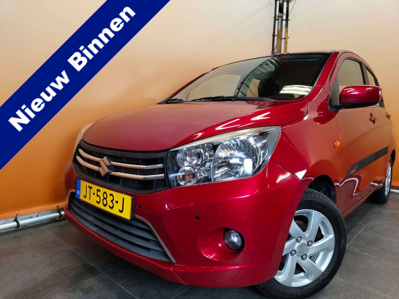 Suzuki Celerio - 1.0 Exclusive lage km stand | navigatie metaallak - AutoWereld.nl
