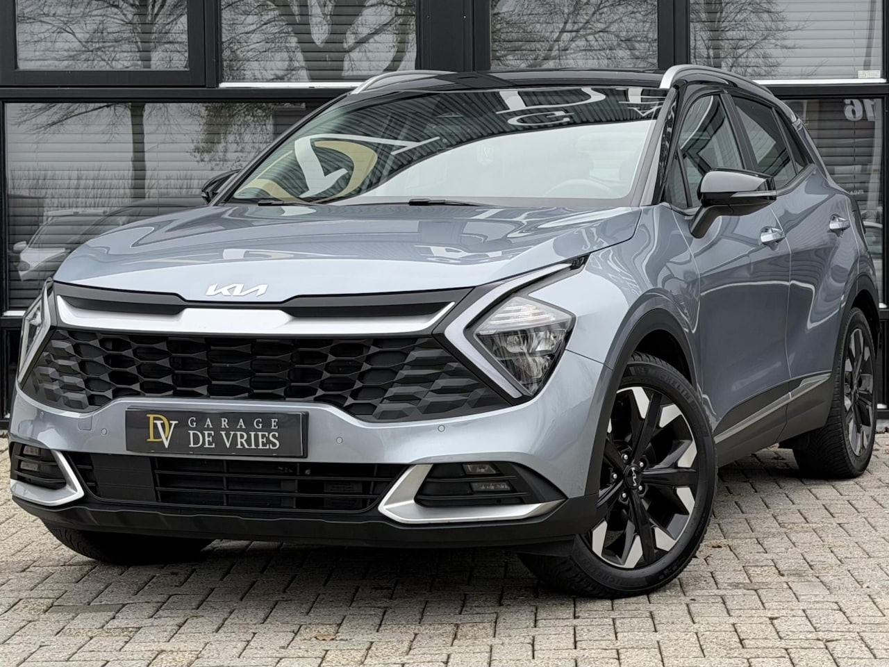 Kia Sportage - 1.6 T-GDi Plug-in Hybrid AWD DynamicPlusLine ACC Two Tone Garantie - AutoWereld.nl