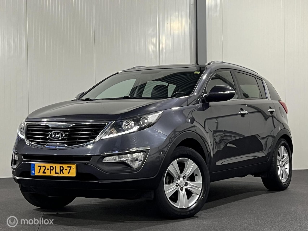 Kia Sportage - 2.0 X-ecutive Plus Pack [ NAP 1e eig. trekhaak panorama ] - AutoWereld.nl
