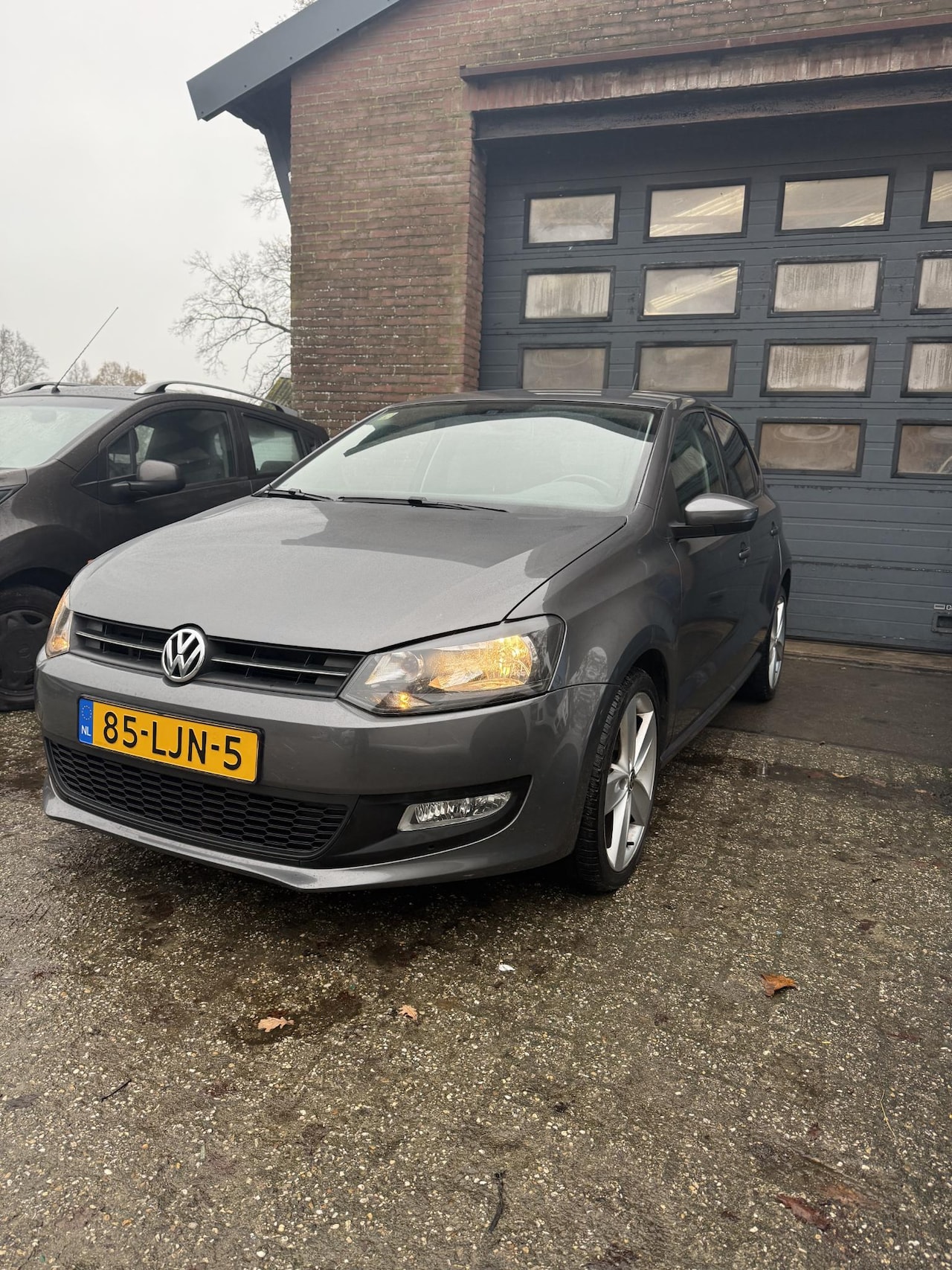 Volkswagen Polo - 1.2 TSI Highline AUTOMAAT/Climate/LMV/NAP - AutoWereld.nl