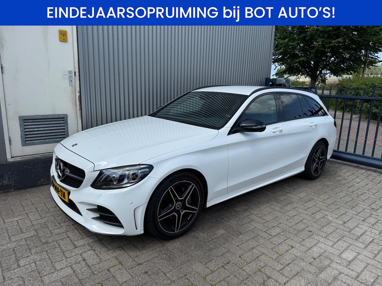 Mercedes-Benz C-klasse Estate - 180 Business Solution AMG / ECC / CRUISE / NAVI / TREKHAAK / CAMERA / SENSOREN / LEDER - AutoWereld.nl